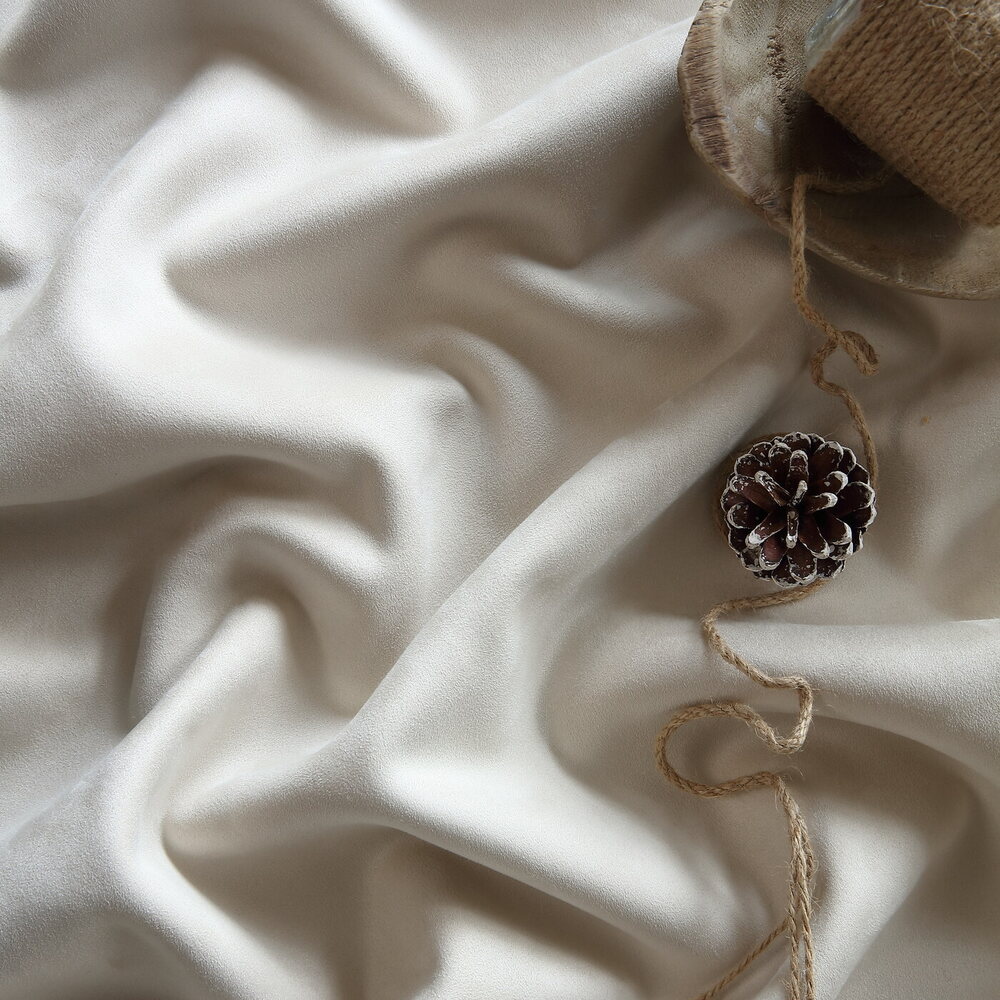 Close-up of Premium Suede, showing its nap and drape.