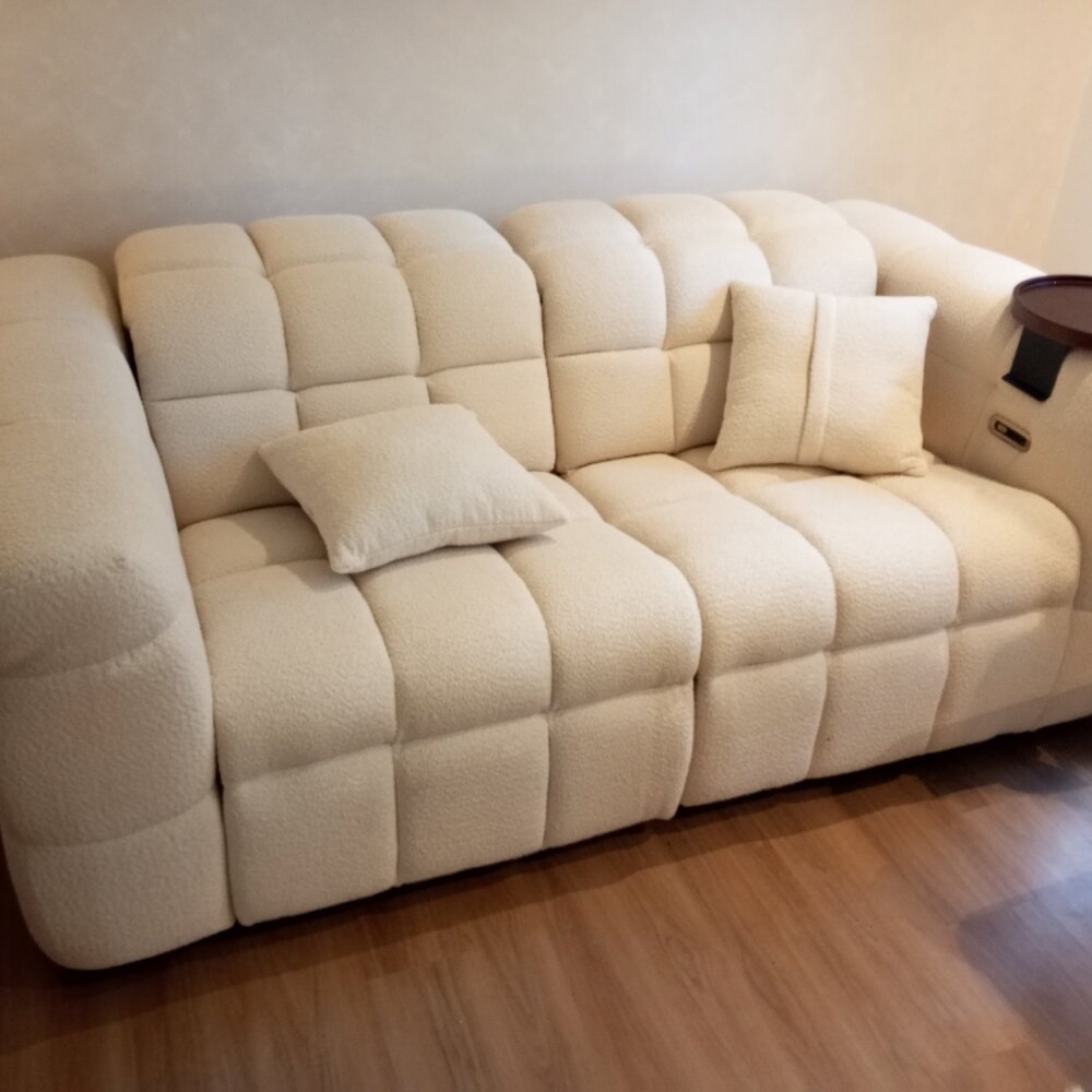 Klara in cream boucle in a customer home